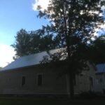 The new standing seam roof on Rosslyn's Carriage Barn is done at last. Hurray!