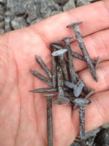 Roofing nails recovered from the driveway after carriage barn roof was replaced.