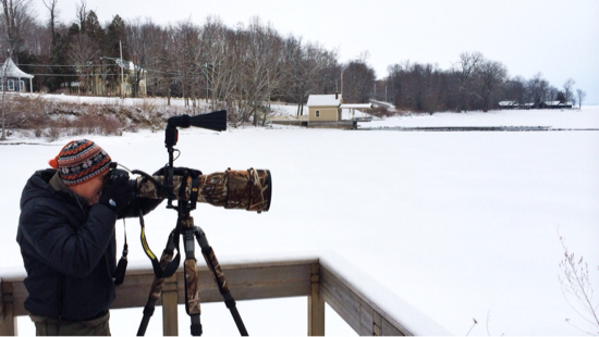 John DiGiacomo photographing Goldeneye ducks at Essex ferry dock. (Photo: virtualDavis)