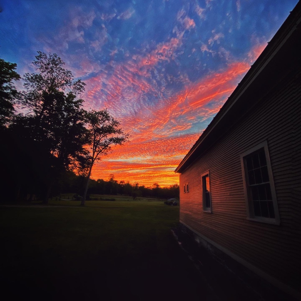 Tie dye dome reflects on carriage barn’s West façade (Source: Geo Davis)