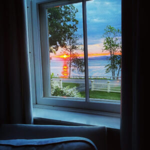 Daybreak: Lake Champlain sunrise through wavy-glass parlor window (Source: Geo Davis)