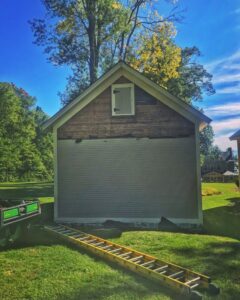 Removing Clapboard Siding from Icehouse (Source: Hroth Ottosen)