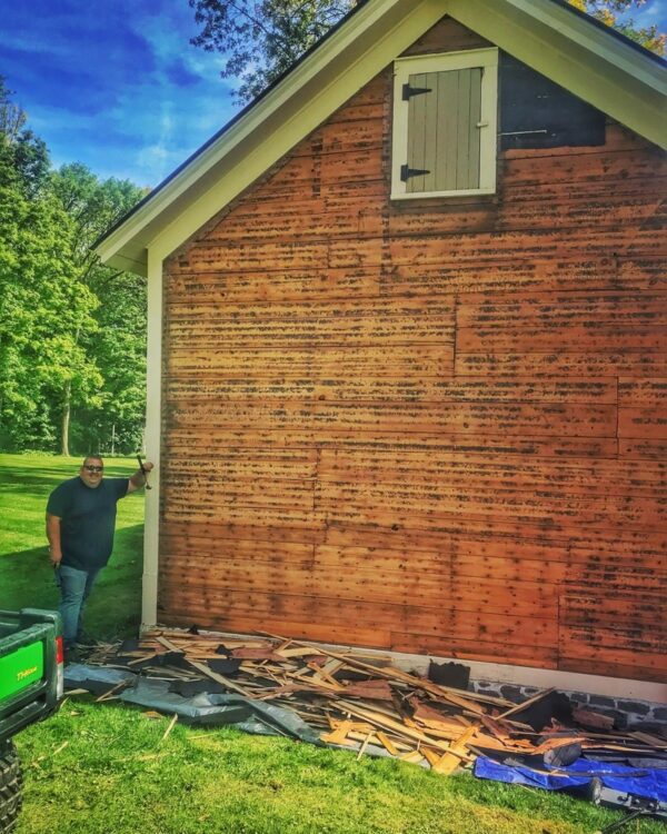 Removing Clapboard Siding from Icehouse (Source: Hroth Ottosen)