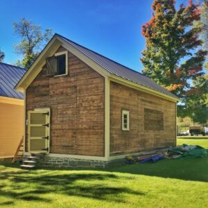 Removing Clapboard Siding from Icehouse (Source: Hroth Ottosen)