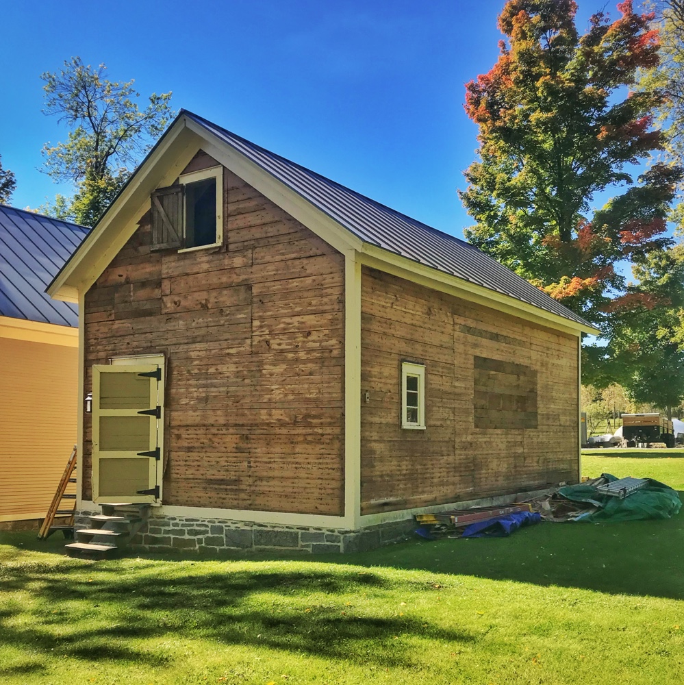 Removing Clapboard Siding from Icehouse