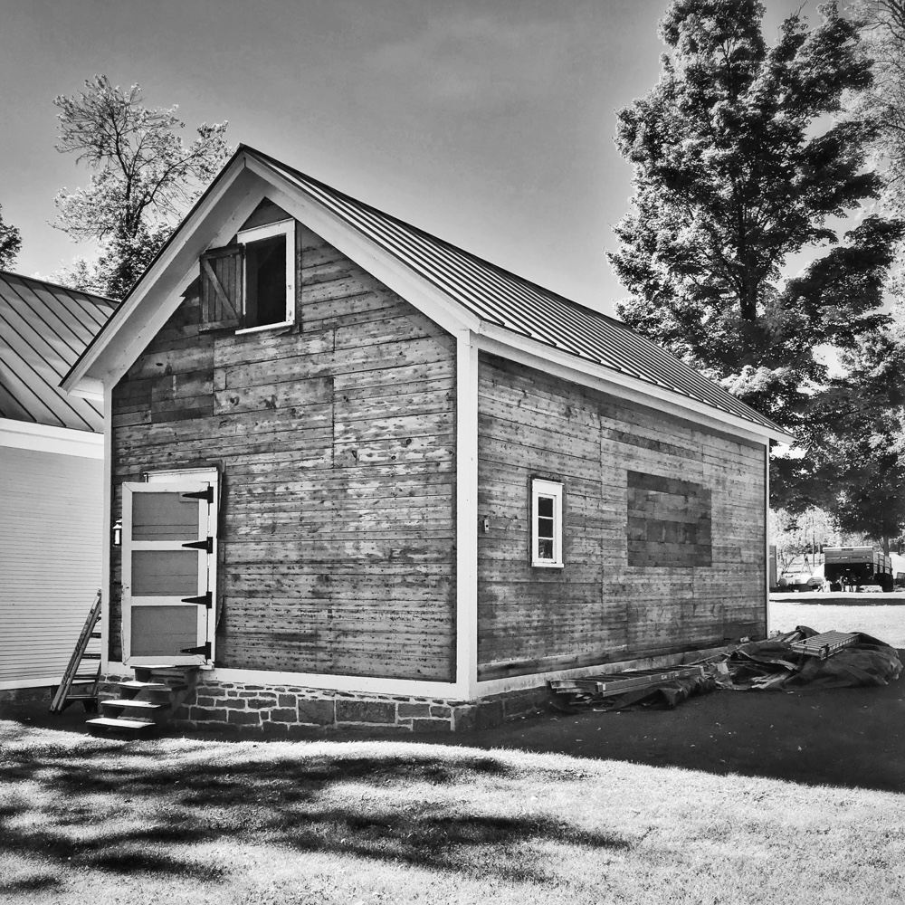 Removing Clapboard Siding from Icehouse (Source: Hroth Ottosen)