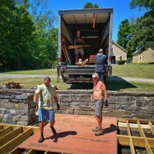 Unloading Garapa Decking, July 2022 (Source: Susan Bacot-Davis)