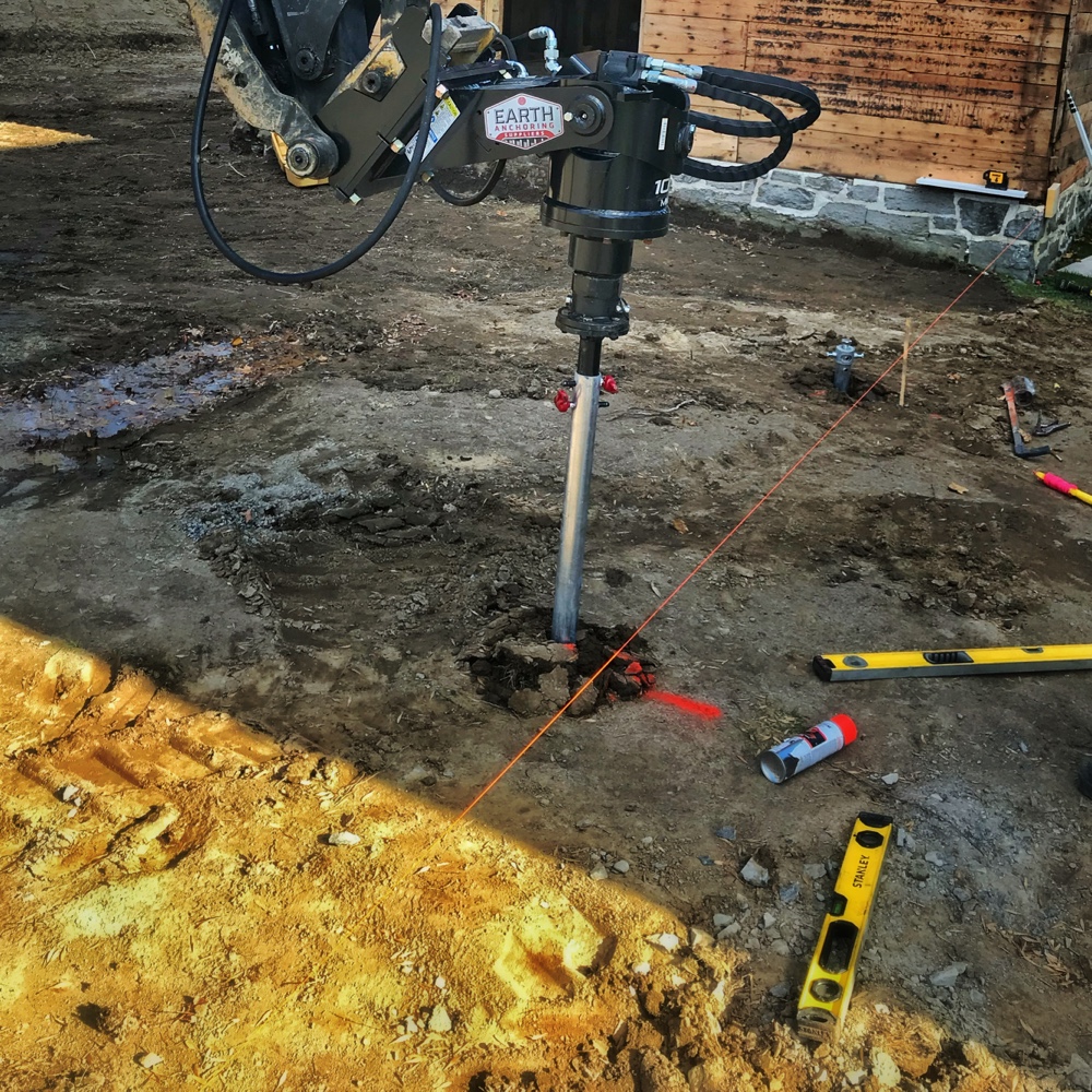 Helical Pier Installation (Photo: Hroth Ottosen)