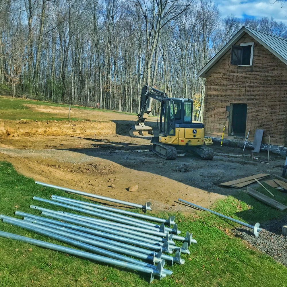 Helical Piers Ready for Installation (Photo: Hroth Ottosen)