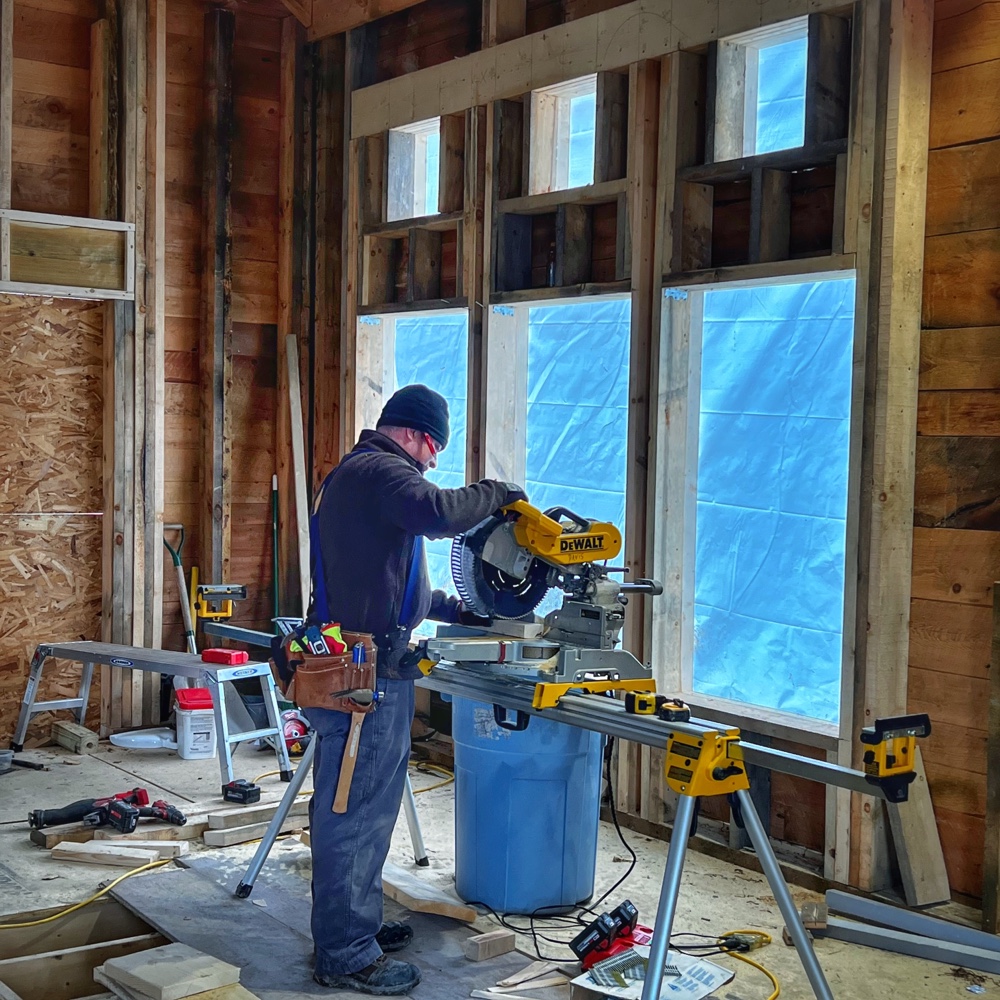 Icehouse Apertures and Transparency: Matt manning the mitre saw (Photo: R.P. Murphy)