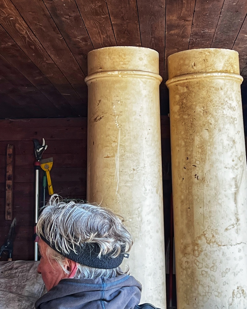 Hroth surveying soon-to-be repurposed columns from carriage barn hayloft to icehouse (Photo: R.P. Murphy)