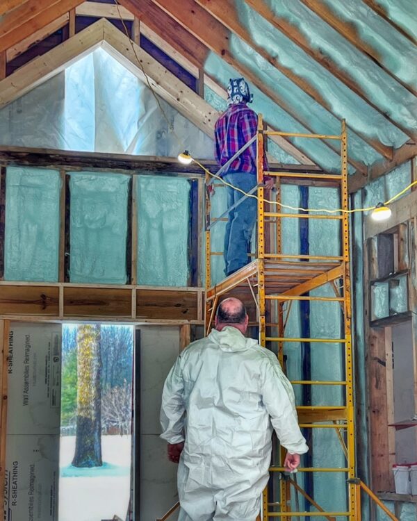 Installing Spray Foam in Icehouse Ceiling (Photo: R.P. Murphy)