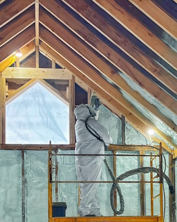 Installing Spray Foam in Icehouse Ceiling (Photo: R.P. Murphy)