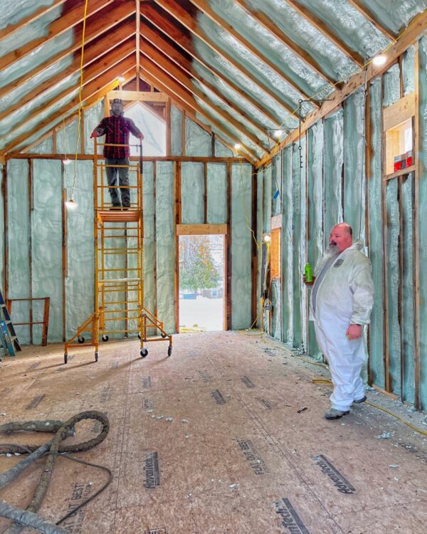 Installing Spray Foam in Icehouse Ceiling (Photo: R.P. Murphy)