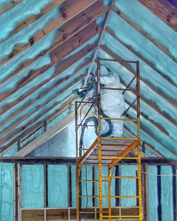 Installing Spray Foam in Icehouse Ceiling (Photo: R.P. Murphy)