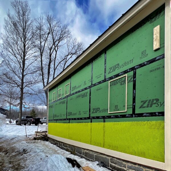 Installing Trim, Slicker, and Temporary Window Grounds on Icehouse (Photo: R.P. Murphy)