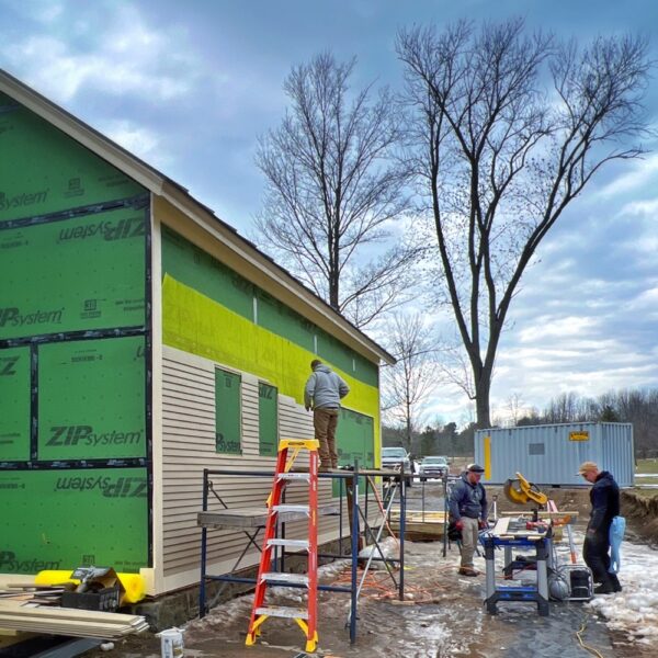 Calvin, Tony, and Matt Install Clapboard on Icehouse, North Elevation (Photo: R.P. Murphy)