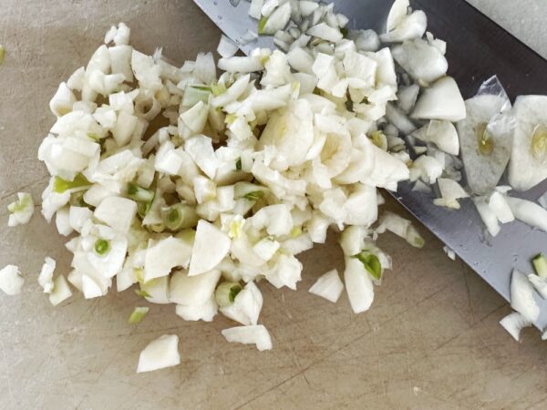 Chop Garlic for Elk Green Chile Stew (Photo: Geo Davis)