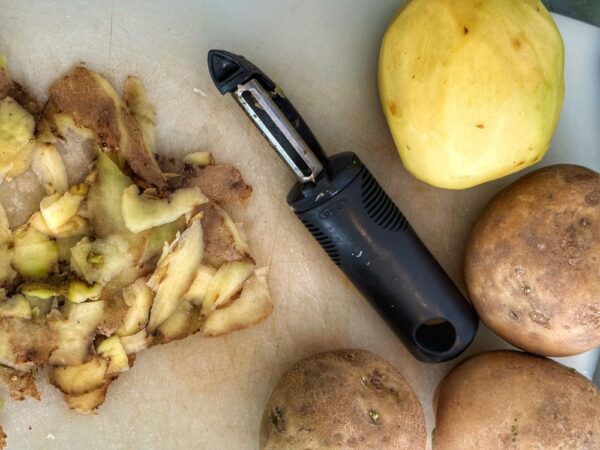 Add Chopped Potatoes to Elk Green Chile Stew (Photo: Geo Davis)