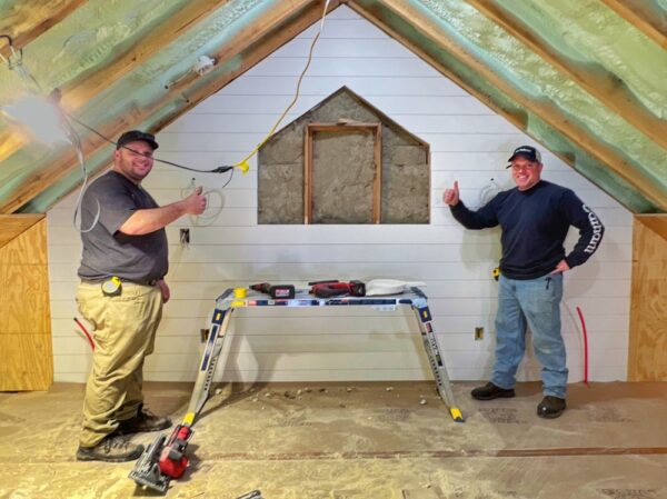 Matt and Jarret Finished Loft Wall (Photo: R.P. Murphy)