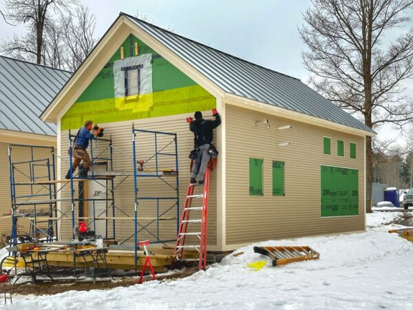 Saturday Siding: Calvin and Eric installing clapboard on the icehouse’s west elevation (Photo: Geo Davis)