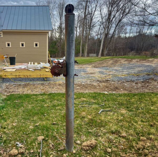 Tennis Net Post with Icehouse Deck and Carriage House (Photo: R.P. Murphy)