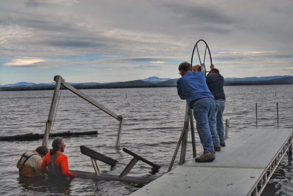 Installing Boatlift with Mark, Tom, and Doug on April 30, 2010 (Photo: Susan Bacot-Davis)