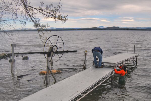 Installing Dock with Doug, Tom and Griffin on April 30, 2010 (Photo: Susan Bacot-Davis)