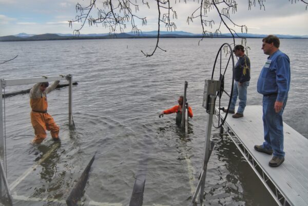 Installing Boatlift with Mark, Tom, and Doug on April 30, 2010 (Photo: Susan Bacot-Davis)