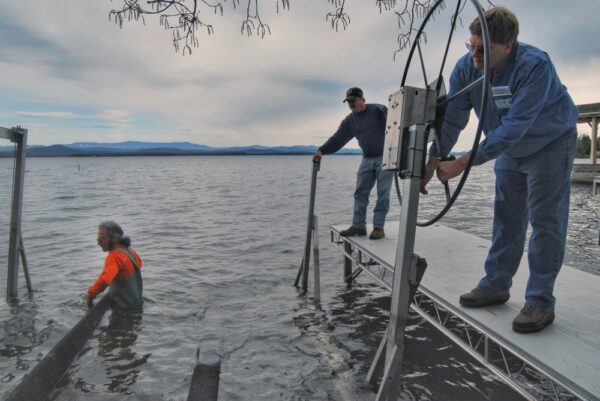 Installing Boatlift with Mark, Tom, and Doug on April 30, 2010 (Photo: Susan Bacot-Davis)