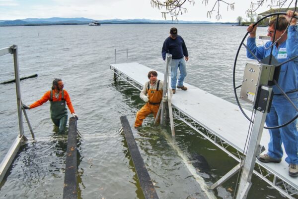 Installing Boatlift with Mark, Tom, and Doug on April 30, 2010 (Photo: Susan Bacot-Davis)