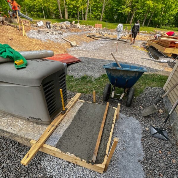 Leveling Concrete for Mini Split Slab (Photo: R.P. Murphy)