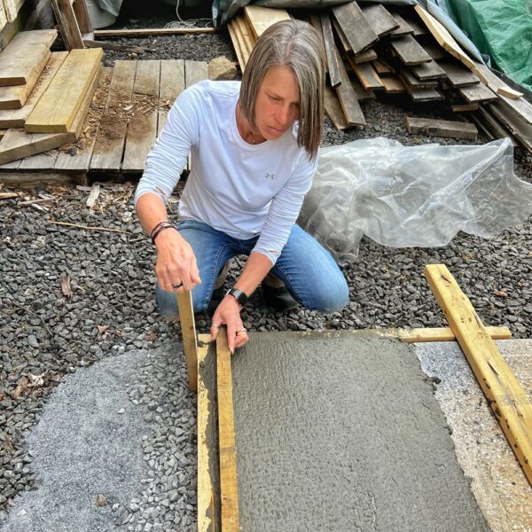 Pam Leveling Concrete for Mini Split Slab (Photo: Tony Foster)