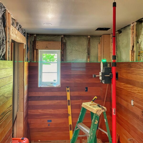 Garapa Paneling Progress in Icehouse Bathroom (Photo: Eric Crowningshield)