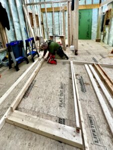 January 2023 Framing Flashback: Matt Pre-framing Wall (Photo: R.P. Murphy)