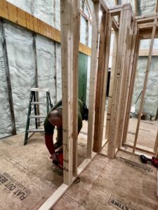 January 2023 Framing Flashback: Matt Framing Bathroom/Mechanical Room Wall (Photo: R.P. Murphy)