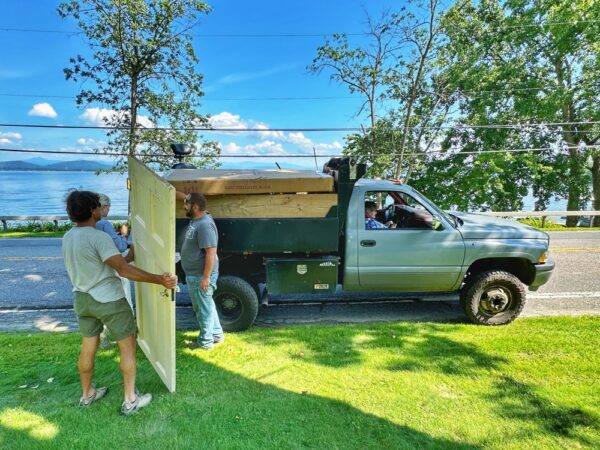 John Assists with Yard Sale Cleanup (Photo: Geo Davis)