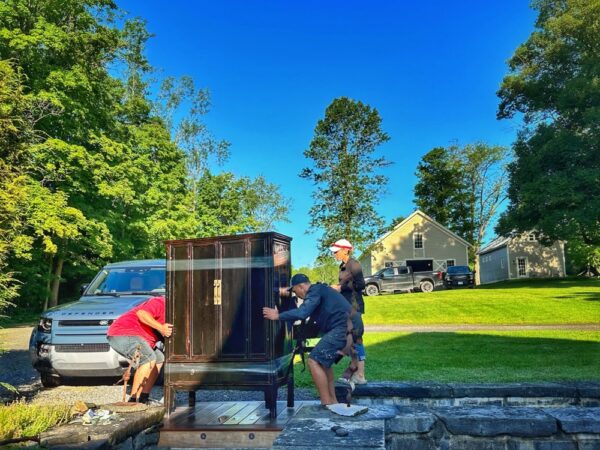 Supi, Pam, and Tony Moving Chinese Armoire (Photo: Geo Davis)