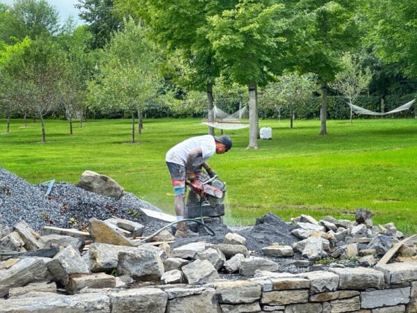 Tony Demo Sawing Repurposed Limestone (Photo: Geo Davis)