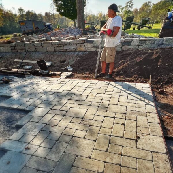 Tony Solving the Paver Puzzle (Photo: Pam Murphy)