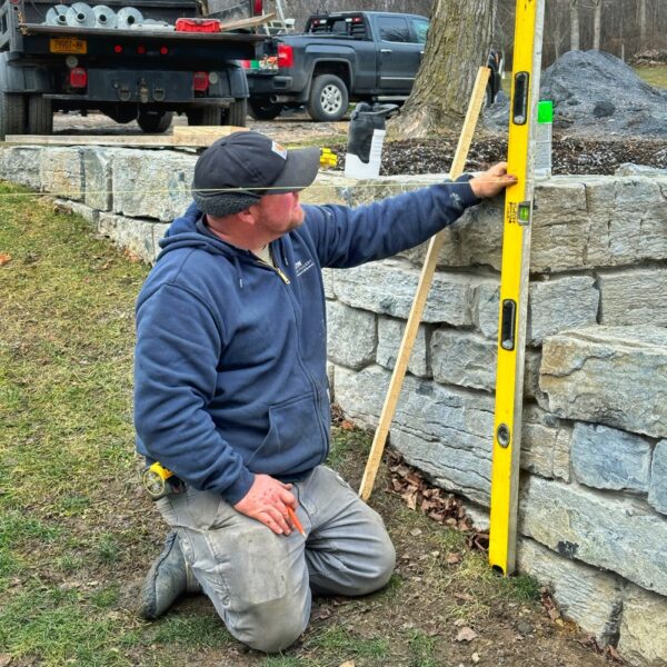 Bob Setting Up For Helical Pile Installation (Photo: Geo Davis)