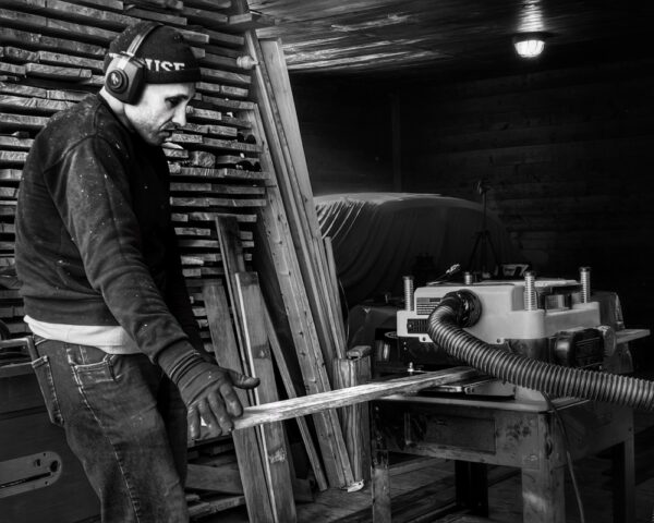 Tony Planing Repurposed Lumber (Photo: R.P. Murphy)