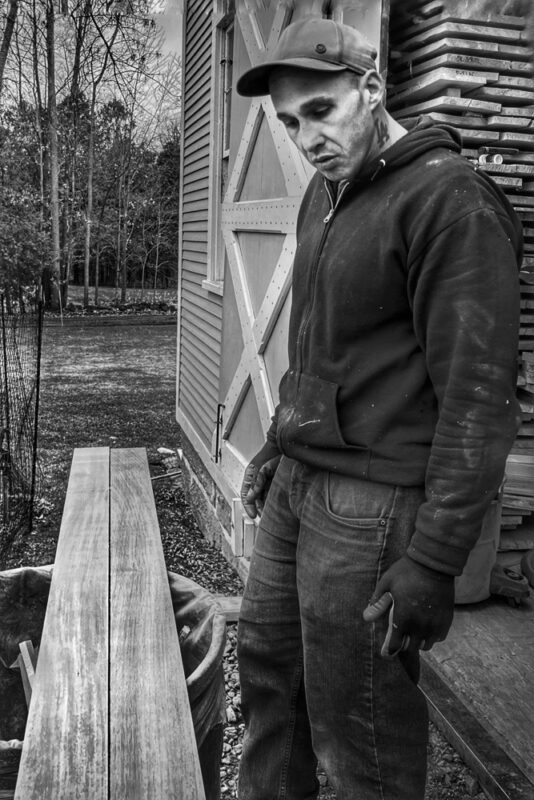 Tony Evaluating Planed Lumber (Photo: R.P. Murphy)