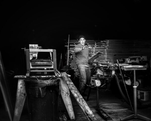 Tony While Planing Lumber (Photo: R.P. Murphy)