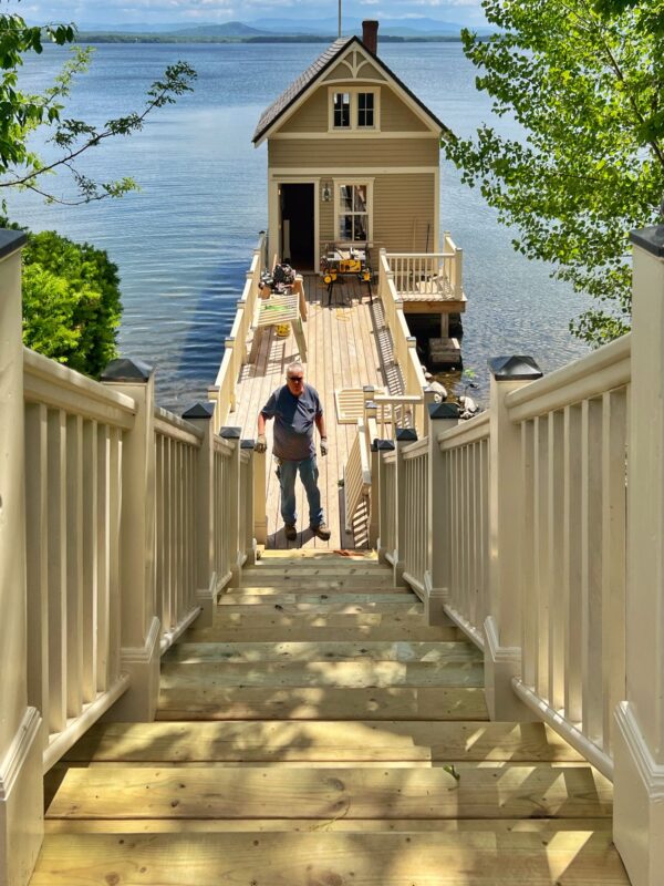 Peter Vaiciulis Installing Posts and Railings for Lakeside Staircase (Photo: Tony Foster)