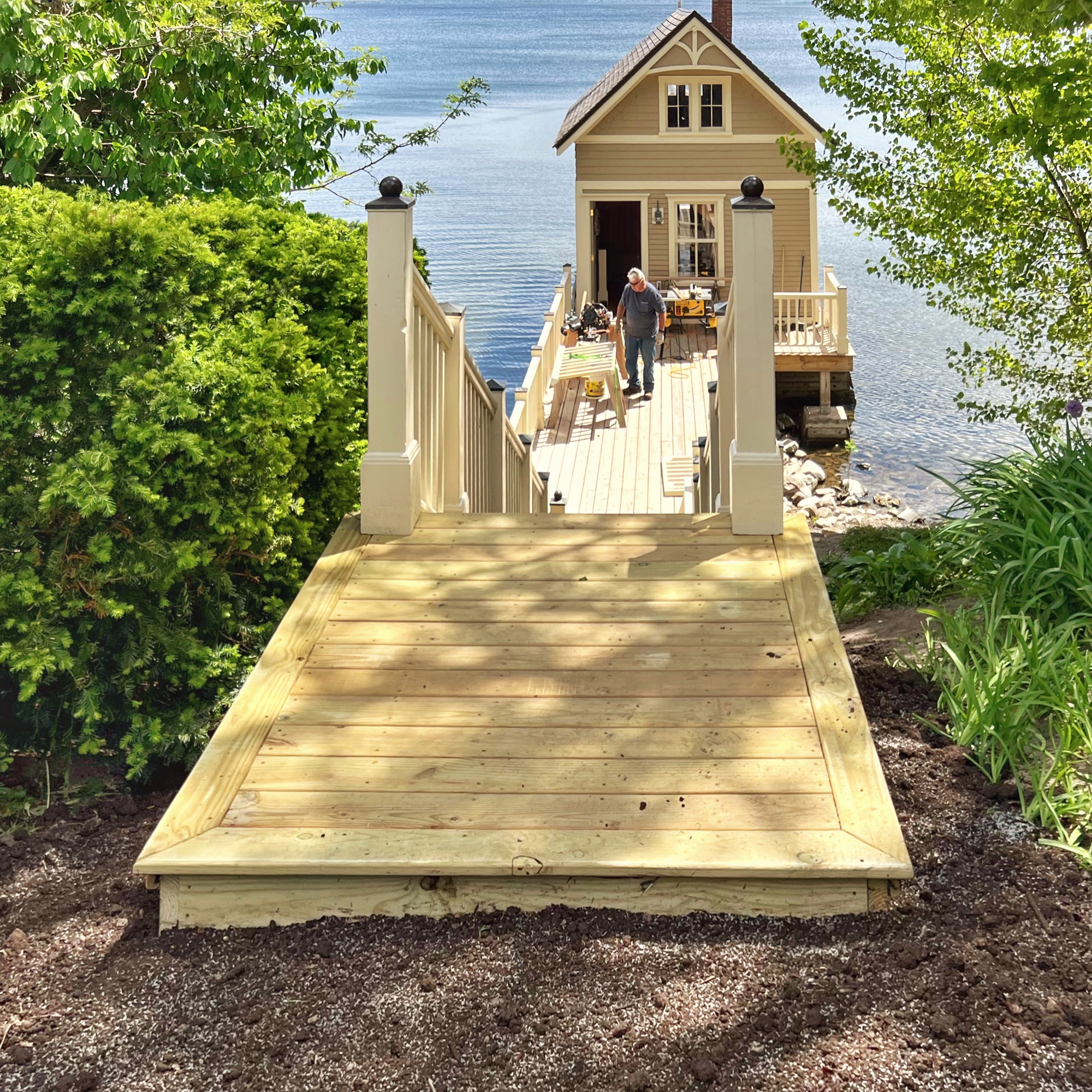 Installing Posts and Railings for Lakeside Staircase (Photo: Tony Foster)