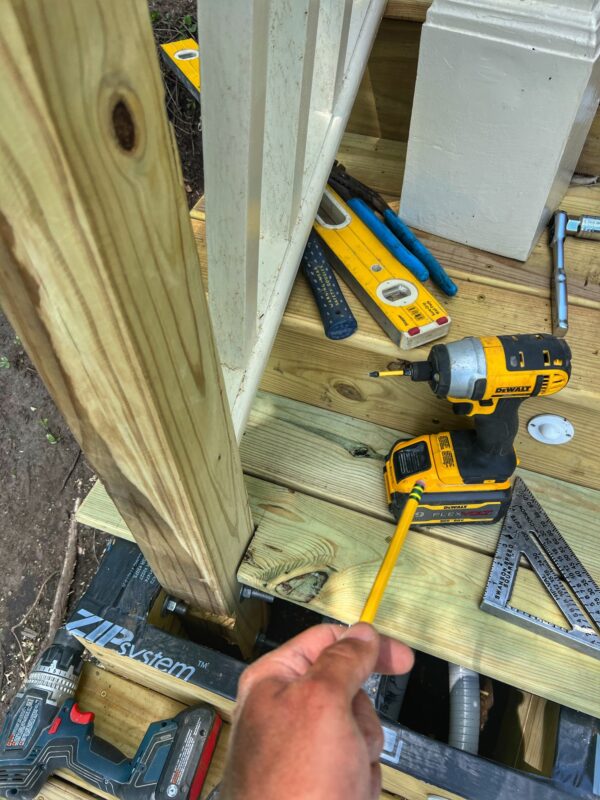 Installing Posts and Railings for Lakeside Staircase (Photo: Tony Foster)